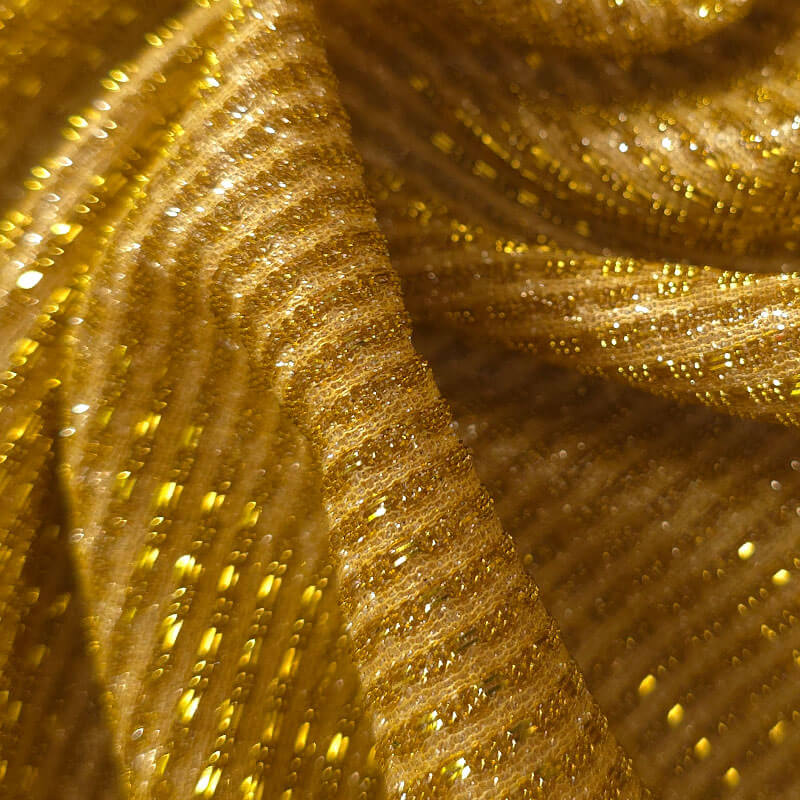 tejido brillante adaptable al cuerpo