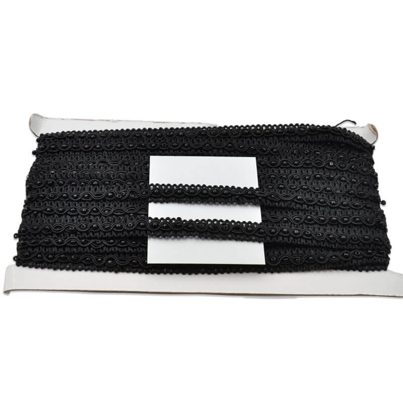 Pasamanería negra ancha para remates textiles