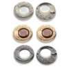 26595601060-boton-metalico-premium-para-confeccion Botón metálico con perla central y strass referencia 265.956010.60