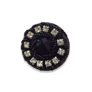 Botón strass negro con cristales transparentes